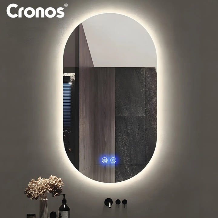 Specchio riscaldato Cronos, ovale 50x80 cm, LED a tre colori, grado di protezione IP44, sistema antiappannamento