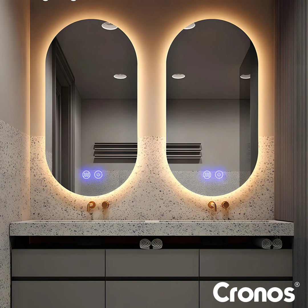 Specchio riscaldato Cronos, ovale 50x80 cm, LED a tre colori, grado di protezione IP44, sistema antiappannamento